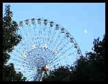 The Texas Star had a big Texas moon behind it.